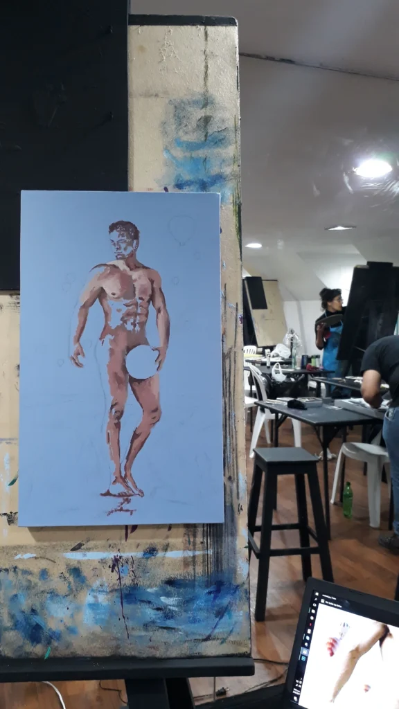 artista visual pintando figura humana en proceso creativo explorando tensión y presencia