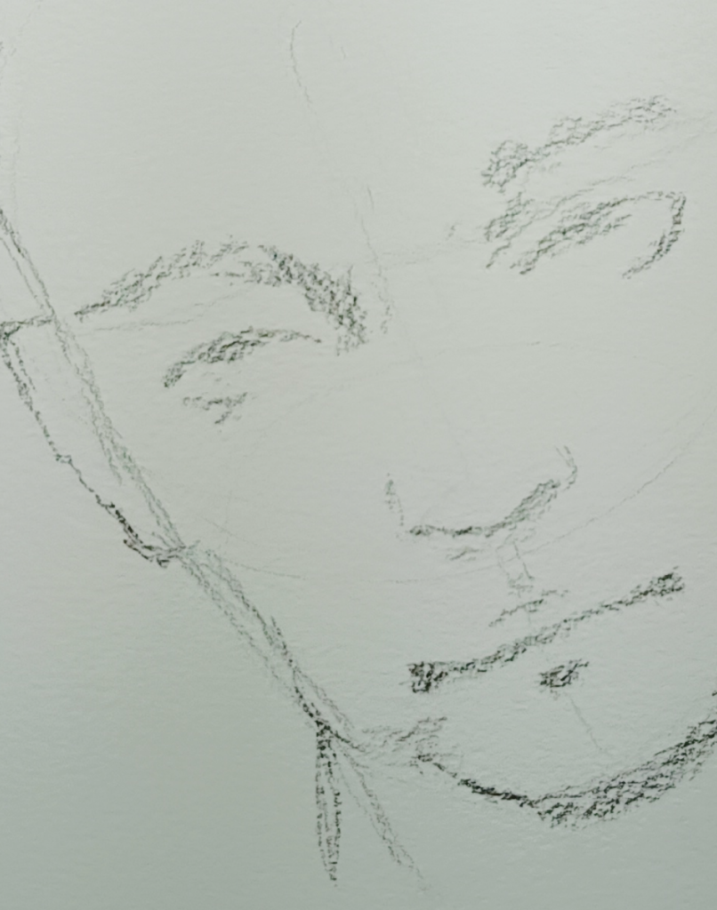 Detalle de desvanecimiento en un dibujo de rostro masculino de Yohan Pixone, usado como recurso emocional.