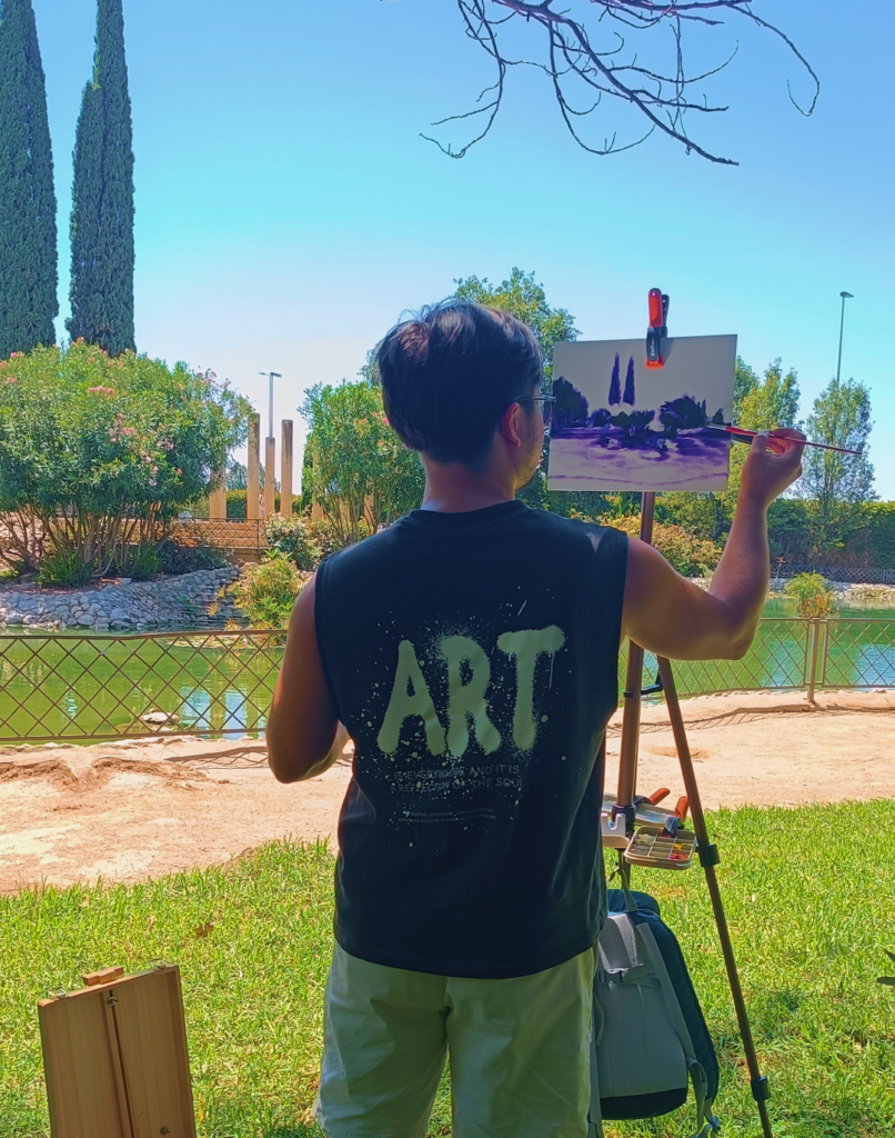 Yohan Pixone durante una sesión de pintura plein air de su Laboratorio de Campo en el Parque Federico García Lorca, Granada.