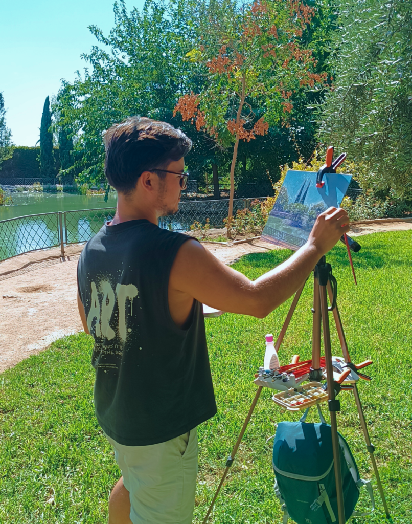 Yohan Pixone durante una sesión de pintura plein air de su Laboratorio de Campo en el Parque Federico García Lorca, Granada.